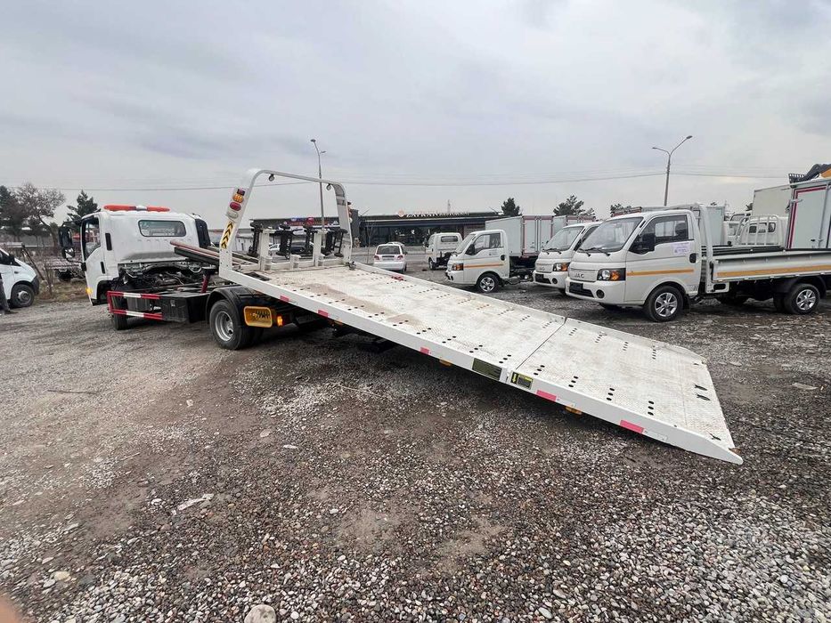 ISUZU ELF KV100 Эвакуатор