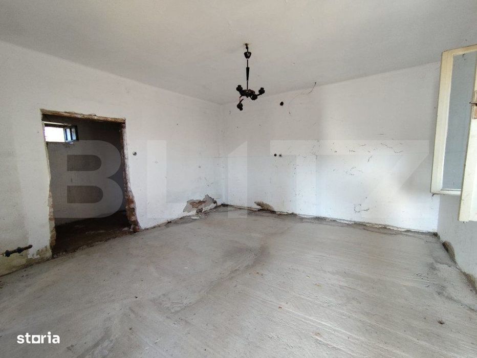 Casa individuala, 2 camere, 2619 mp teren, zona Paclisa