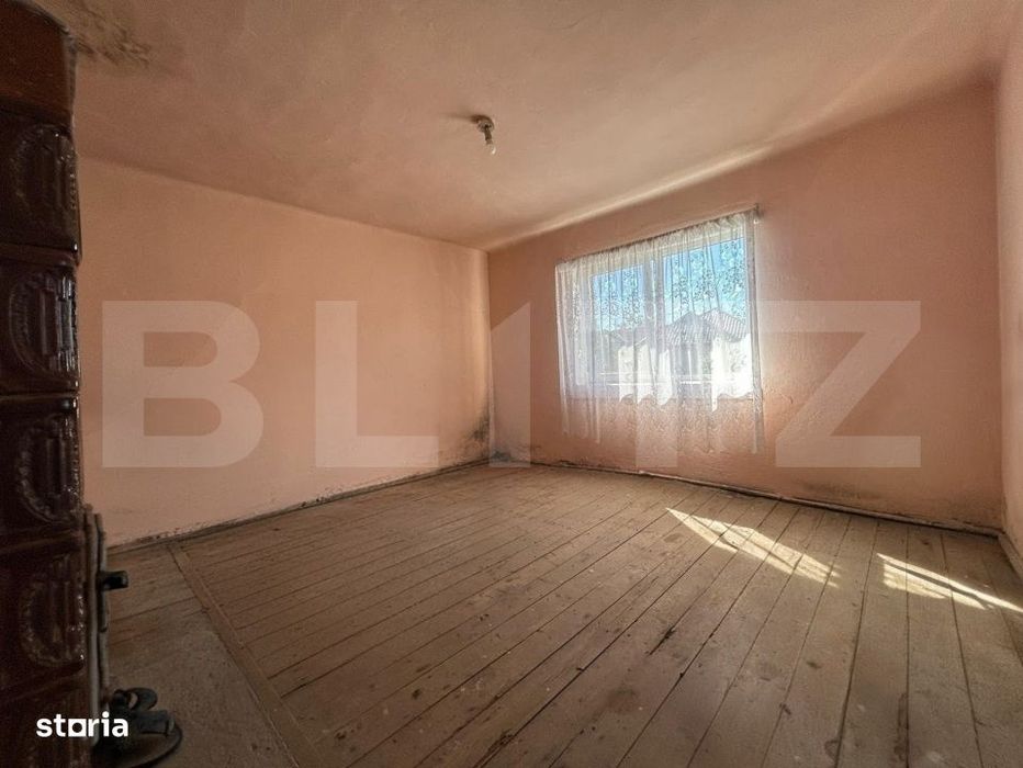 Casa cu teren generos de 1100 mp in Comuna Mica – ideala pentru inve