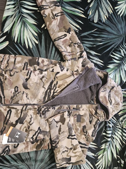 Продам куртку тёплую Under Armour