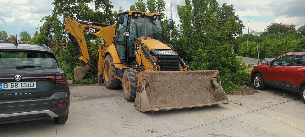 Buldoexcavator Caterpillar 428 F cupa multifuncțional