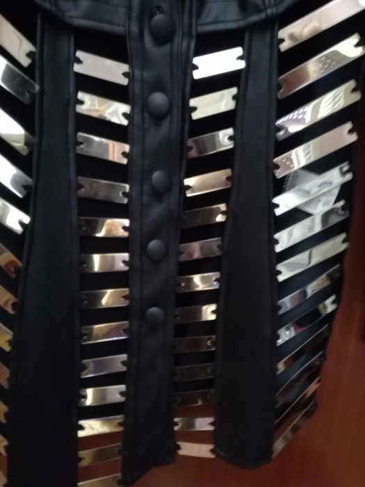 Връхна дреха тип жилетка