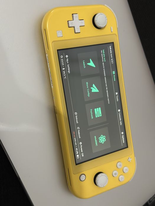 Nintendo Switch Lite Modat + card 64gb