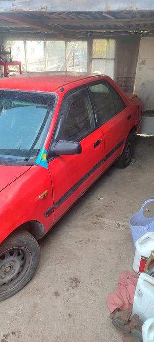 Продам Мазда 323