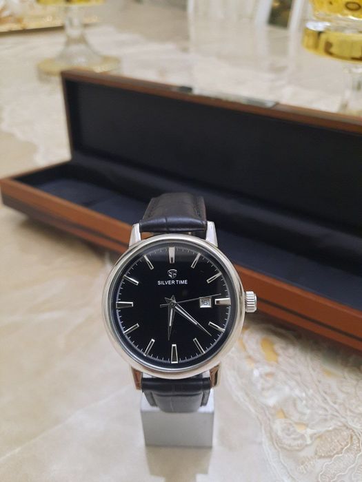 .Серебряные часы