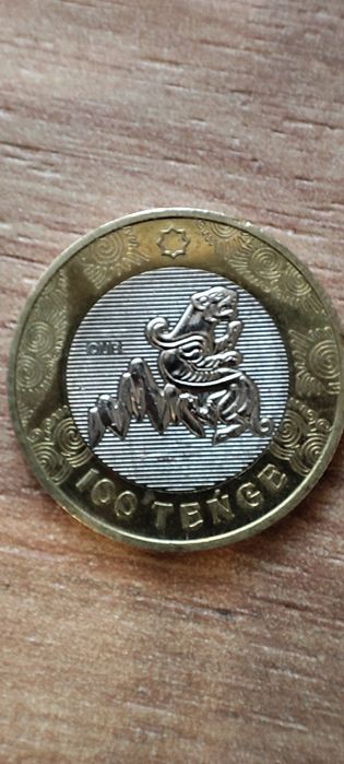 Монета 100 тенге