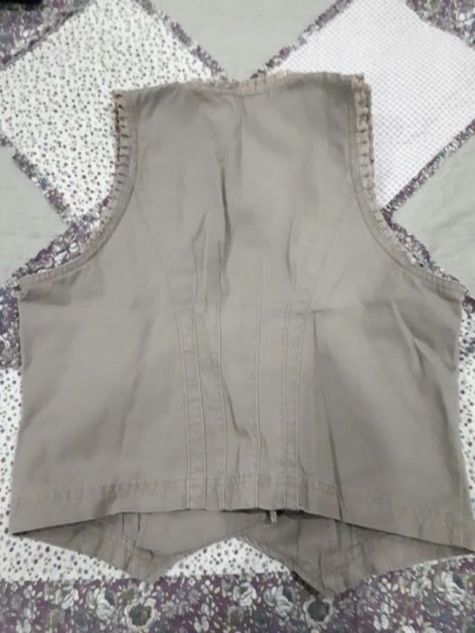 Женская желетка хорошего качества