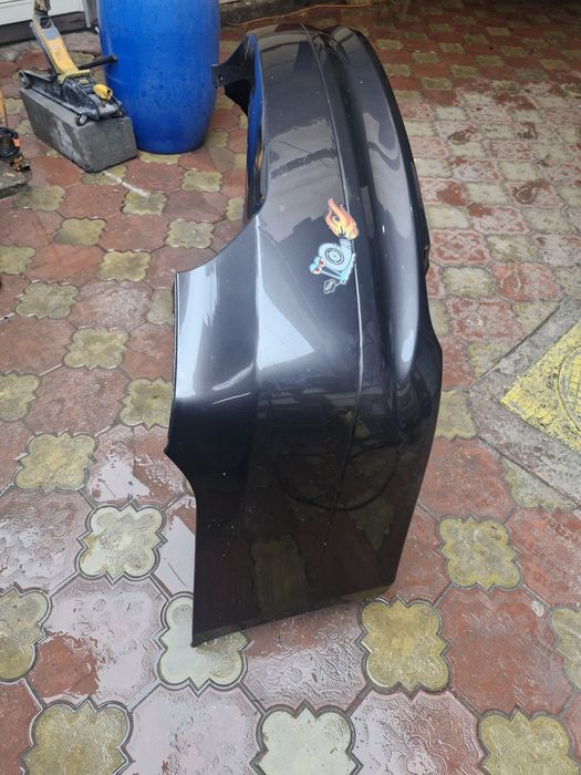Bară spate bmw E 90 vopsită de 1 an..bara a fost nouă