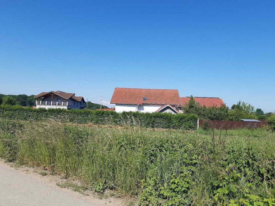 Vand teren intravilan construibil toate utilitatile la drum asfaltat central Lunca Calnicului