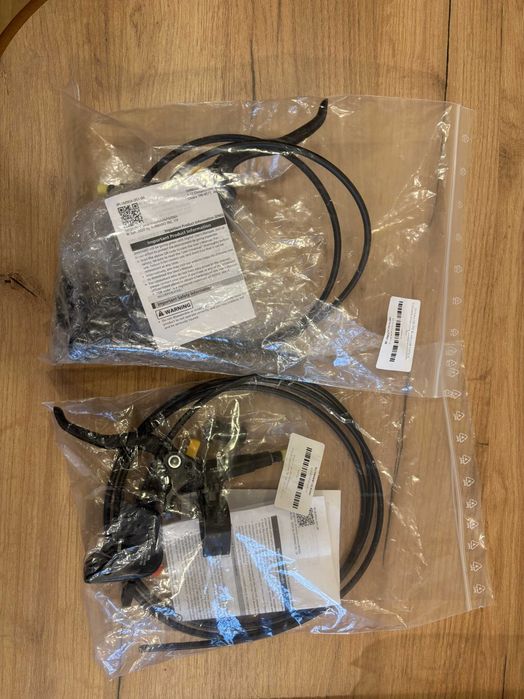 Комплект нови предна и задна дискови спирачки Shimano DEORE BL-M4100/BR-MT410