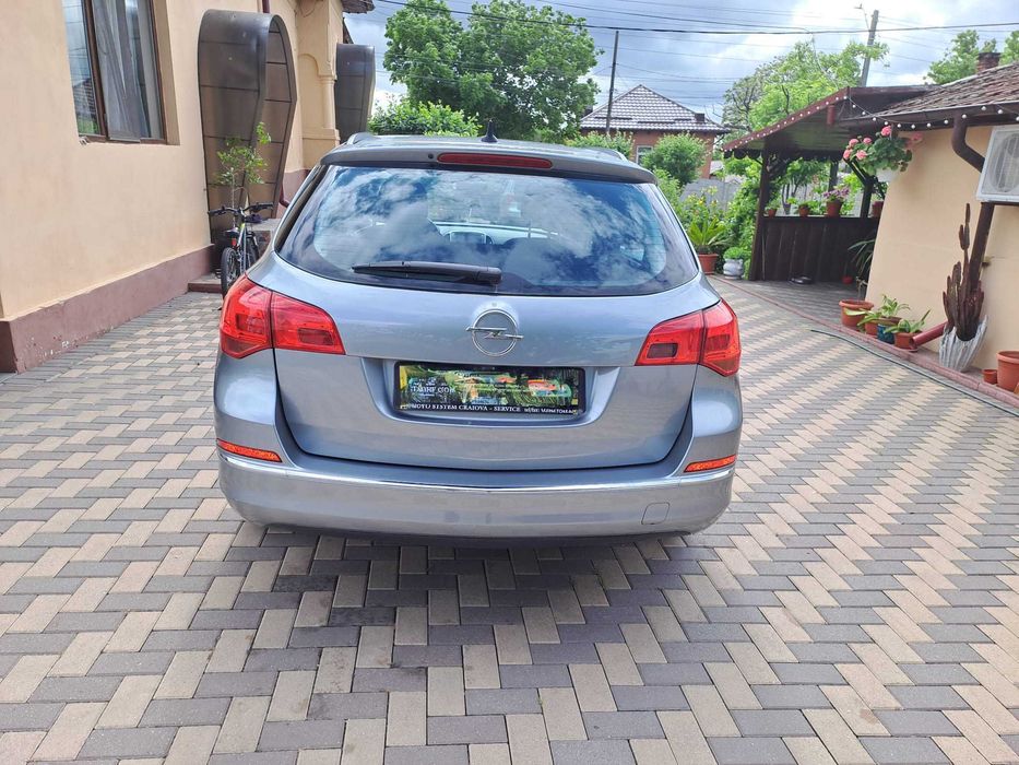 Autoturism Opel Astra J Sport Tourer,1.7 CDTI 110CP/an fabricatie 12/2013/182350 km/Navi/Intretinuta