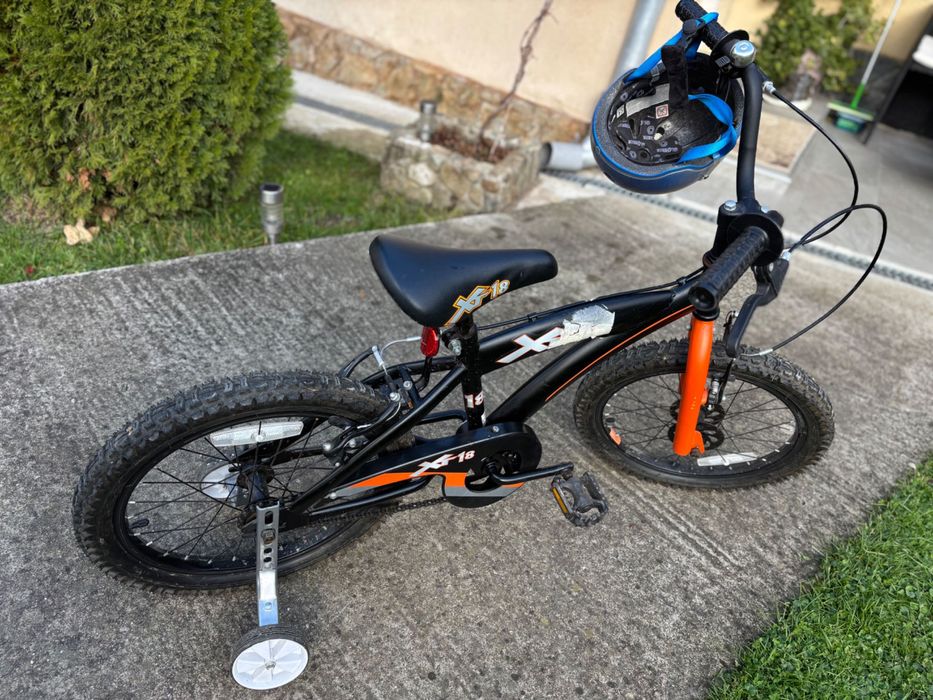 Bicicleta și casca copii