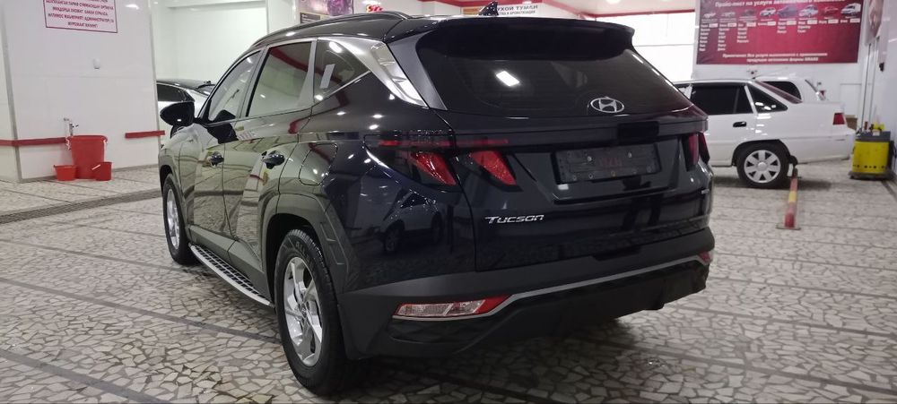 Машина-Hyundai Tucson.