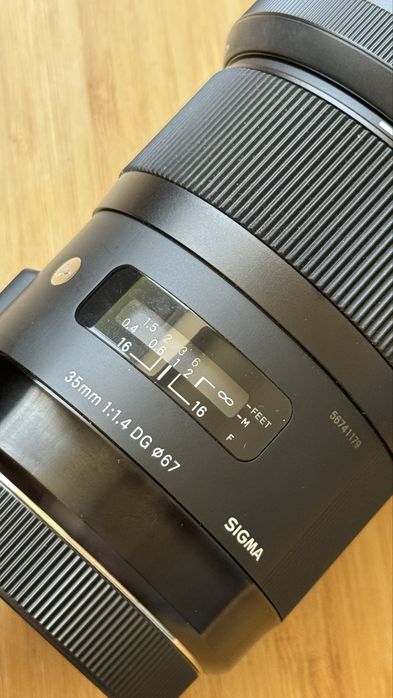 Объектив Sigma 35 art 1.4d