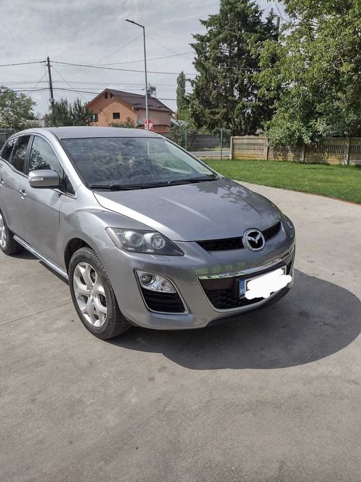 Vind Mazda CX7 ..