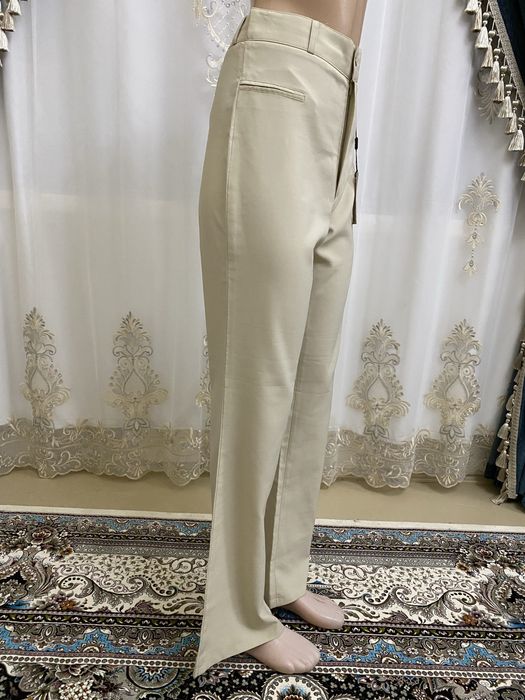 Bryuk yangi kiyilmagan, itiketkasi bor, брюки новые