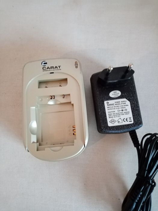 Зарядно за фотоапарати Панасоник.