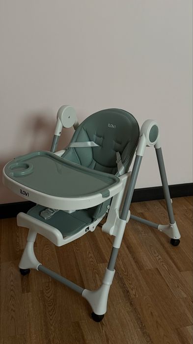 Продам стульчик для кормления ilovi