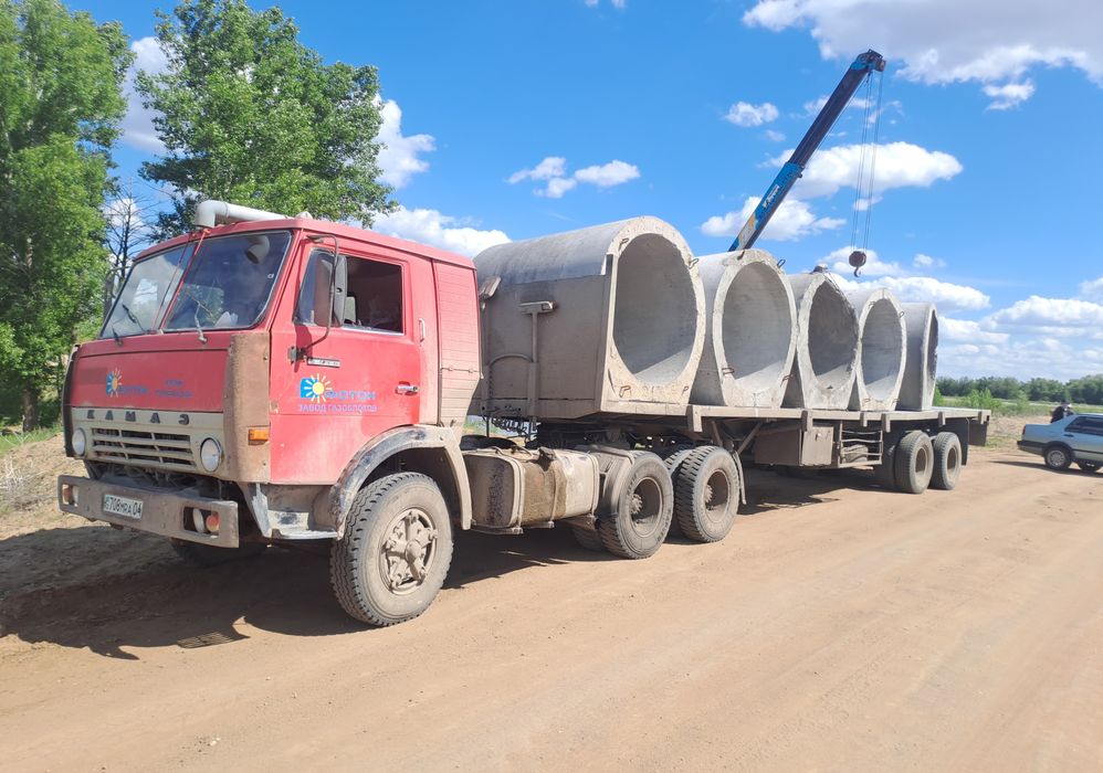 Услуги камаз длиномер в Актобе меж город и по городу.