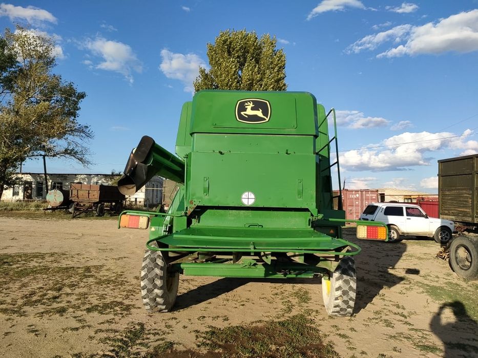 Комбайн John Deere w230