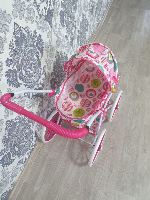 Игрушечная детская коляска