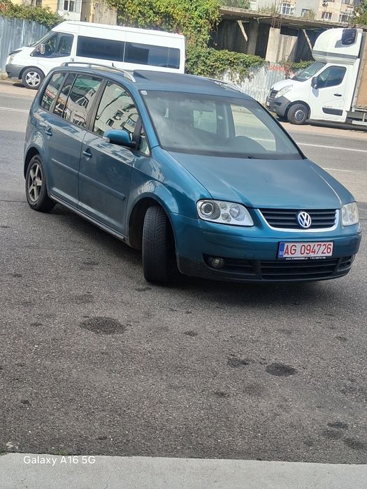 Touran an  2004 ..motor20.  140  cai  dsg bks