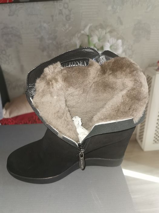 Продам новые сапоги