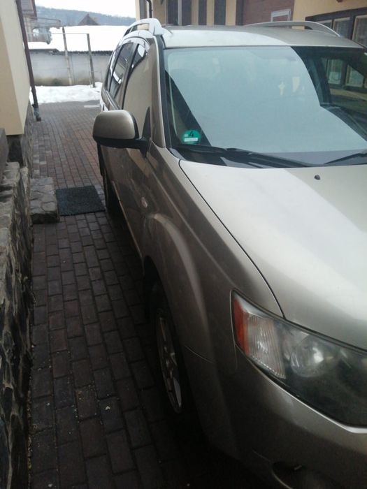 Vând Mitsubishi Outlander