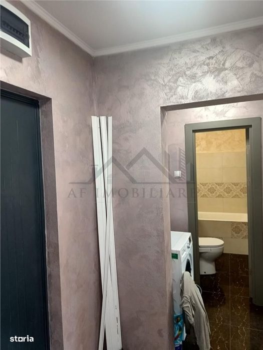 Apartament 2 camere etajul 1 zona Podu Ros