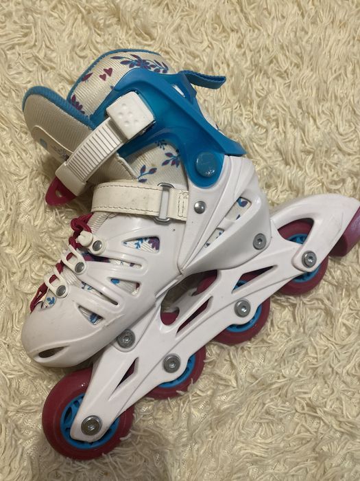 Роликовые коньки