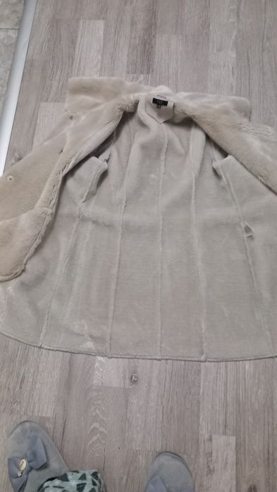 Дамско пухено палто