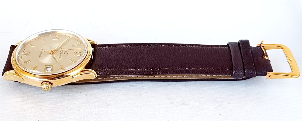 Grovana 17j - позлатен швейцарски механичен часовник с ръчно навиване