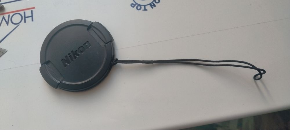 Крышка объектива Nikon.