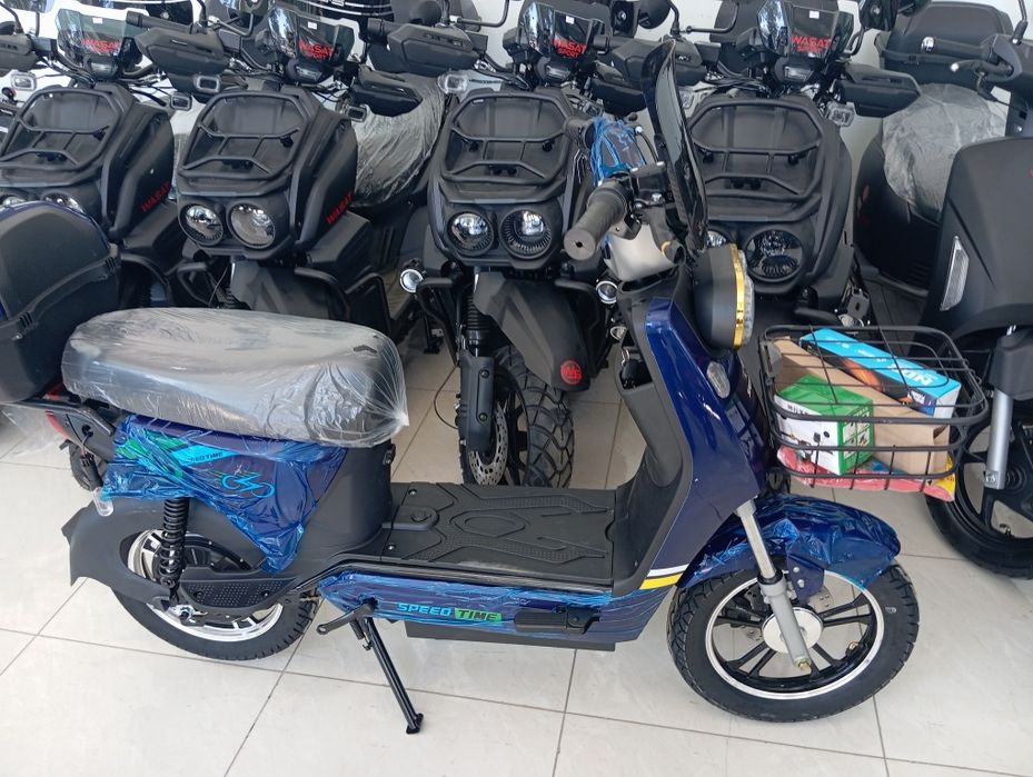 Скутр кваадрацикал