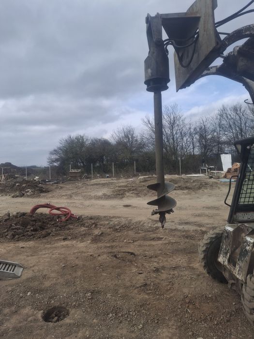 Bobcat de inchiriat Taiere beton gauri gard burghiu pamant sfredel