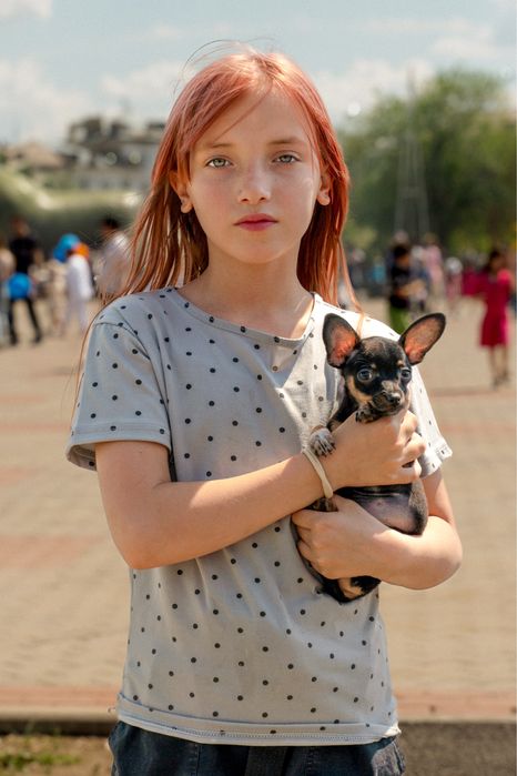 Портретный фотограф.