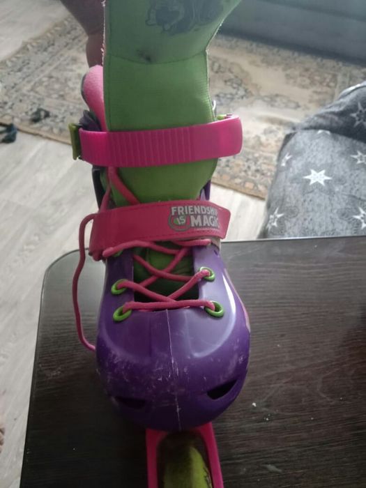 Роликовые коньки