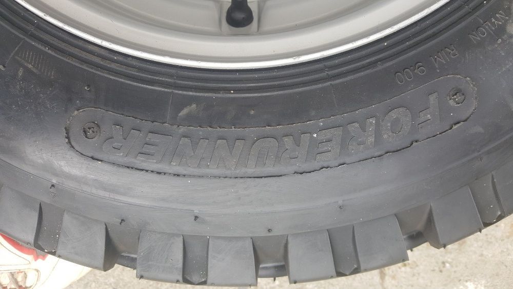 Cauciucuri noi 10.0/75-15.3 echipate pe janta livram in toata tara