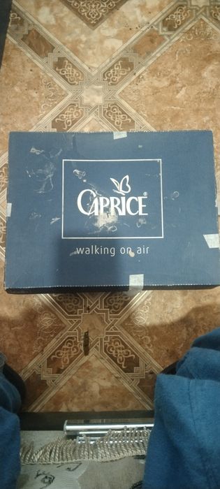 Продам зимнию обувь caprise