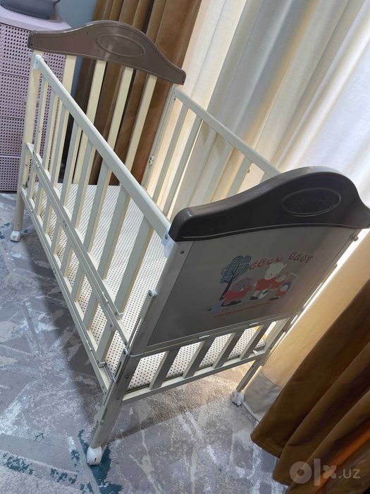 Детская кроватка железная