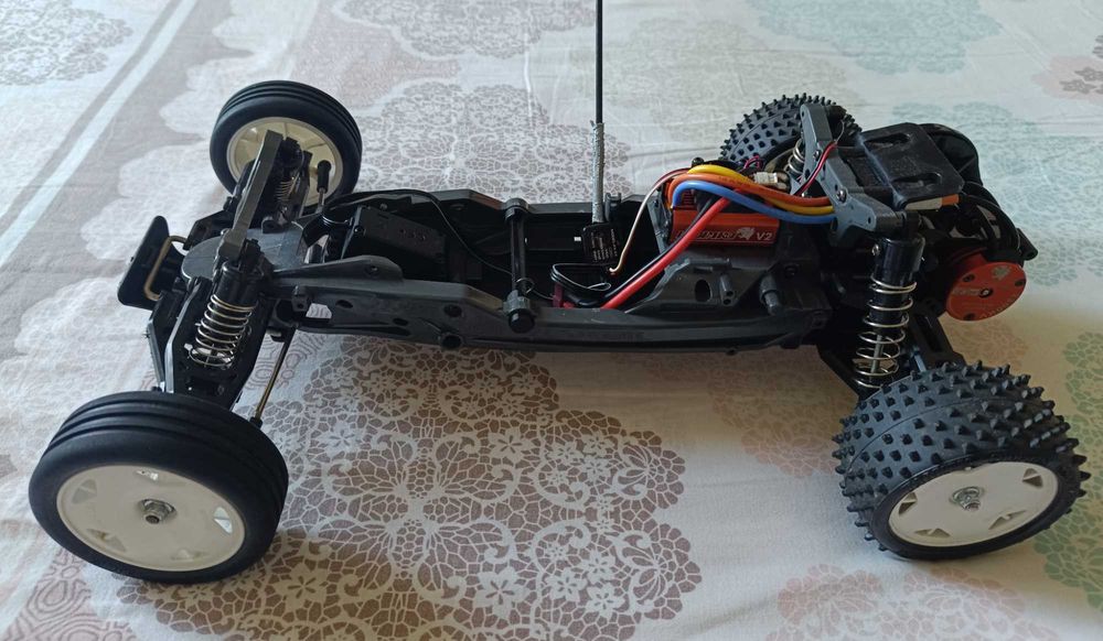 Radiomodel asamblat Tamiya #58587 DT-03 „Neo fighter buggy” (fără electronice)