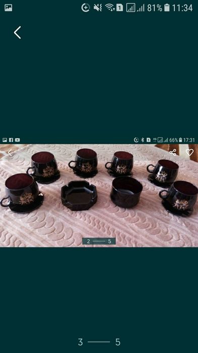 Чайный сервиз из темного стекла.