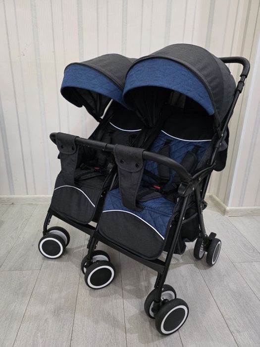 Детская коляска для двойни