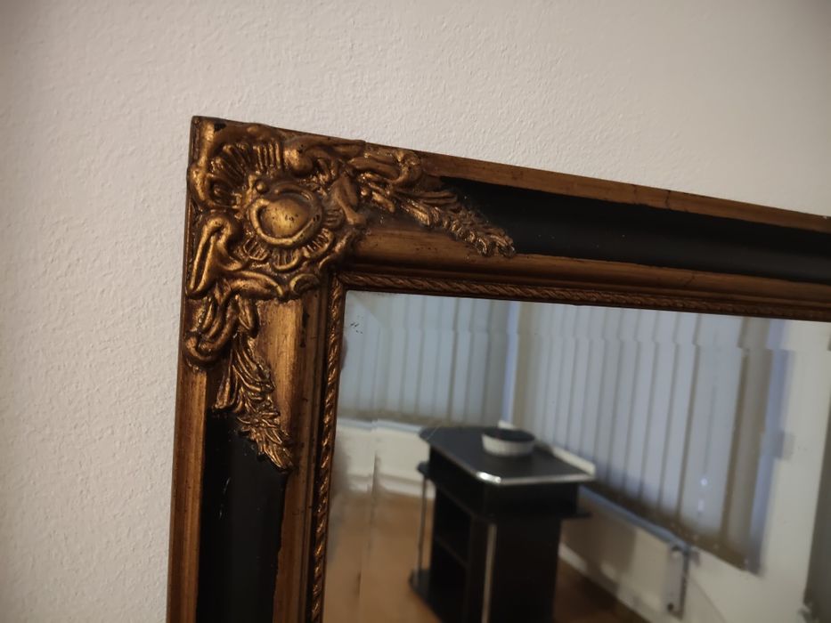 Oglinda antică cu sticla din cristal și muchiile șlefuire tepp