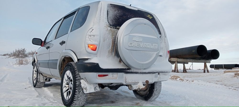 Шевролет     нива