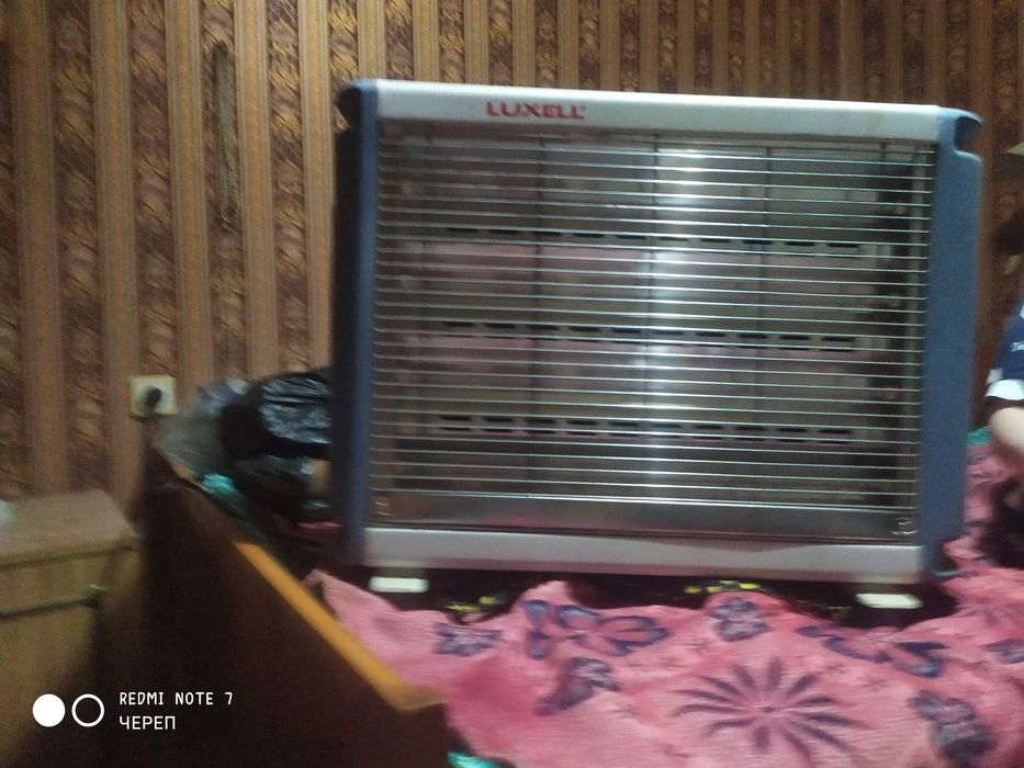 Масляный обогреватель