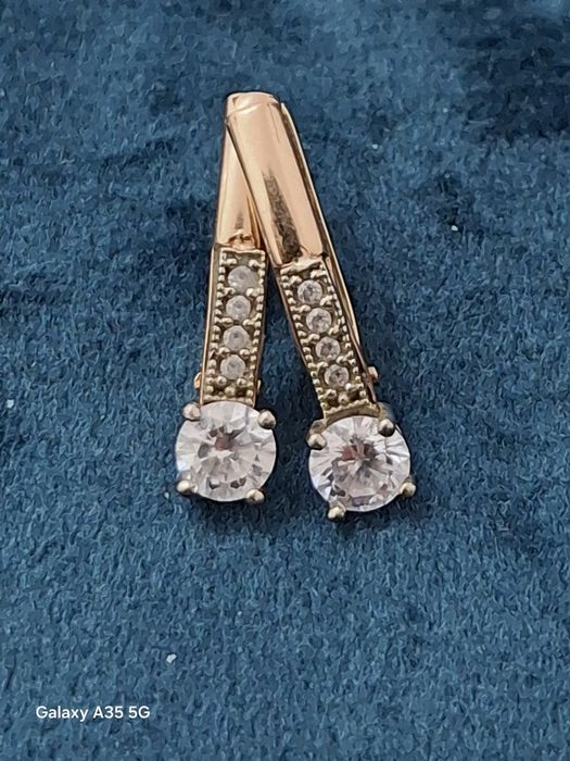 Золотые серьги продам