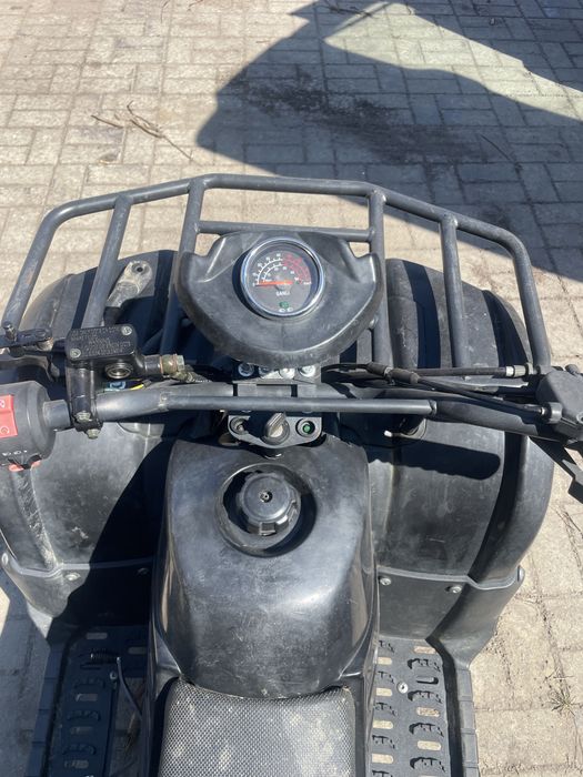 Atv kxd 125 pentru copii