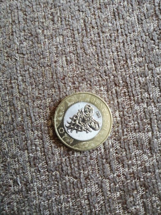 Продам монету номиналом 100 тенге