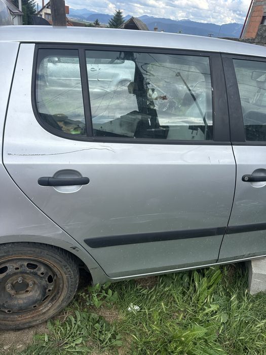 Potiera , usa partea dreapta fata spate Skoda Fabia 2